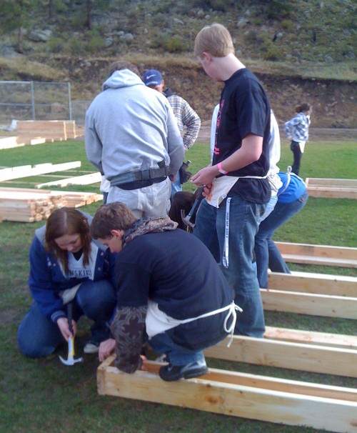 Students at Platte Canyon High School building a wall section
