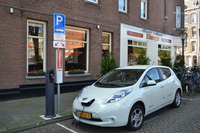 A Nissan Leaf charging in Europe, where charging stations, unlike the present-day United States, are common