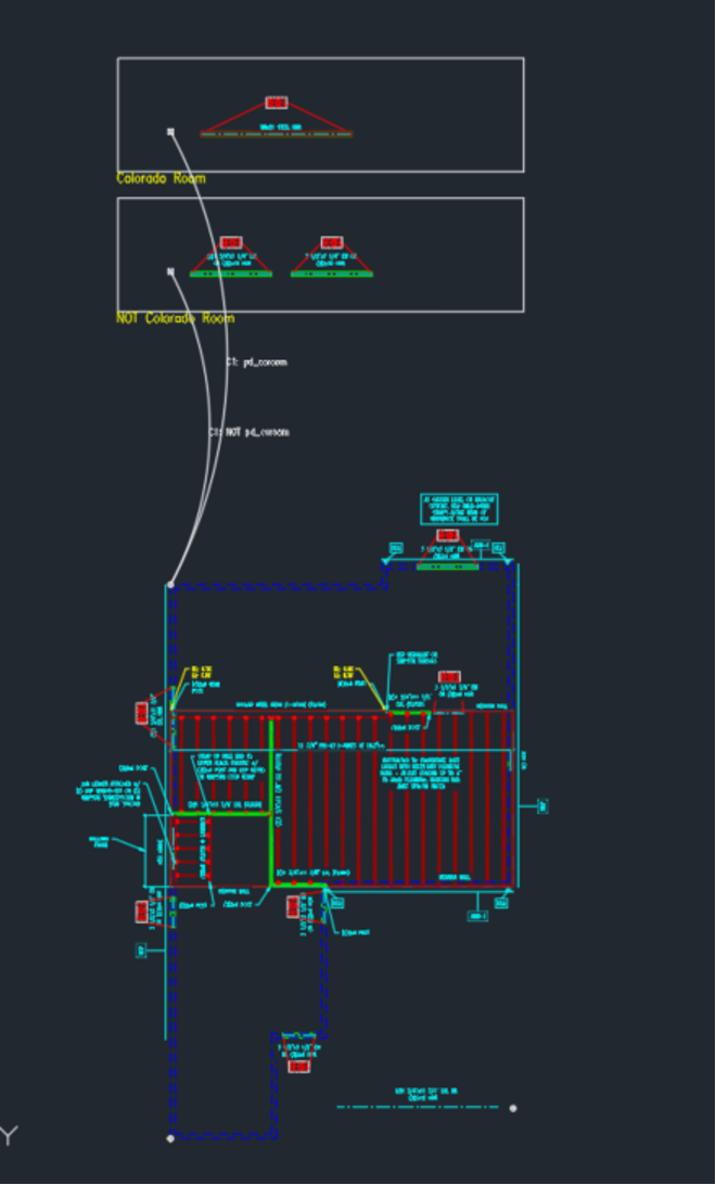 A screenshot of an architectural blueprint that has been created using Sapphire Build in AutoCAD. The background is black, with lines in multiple colors and small colored text notes on the image.