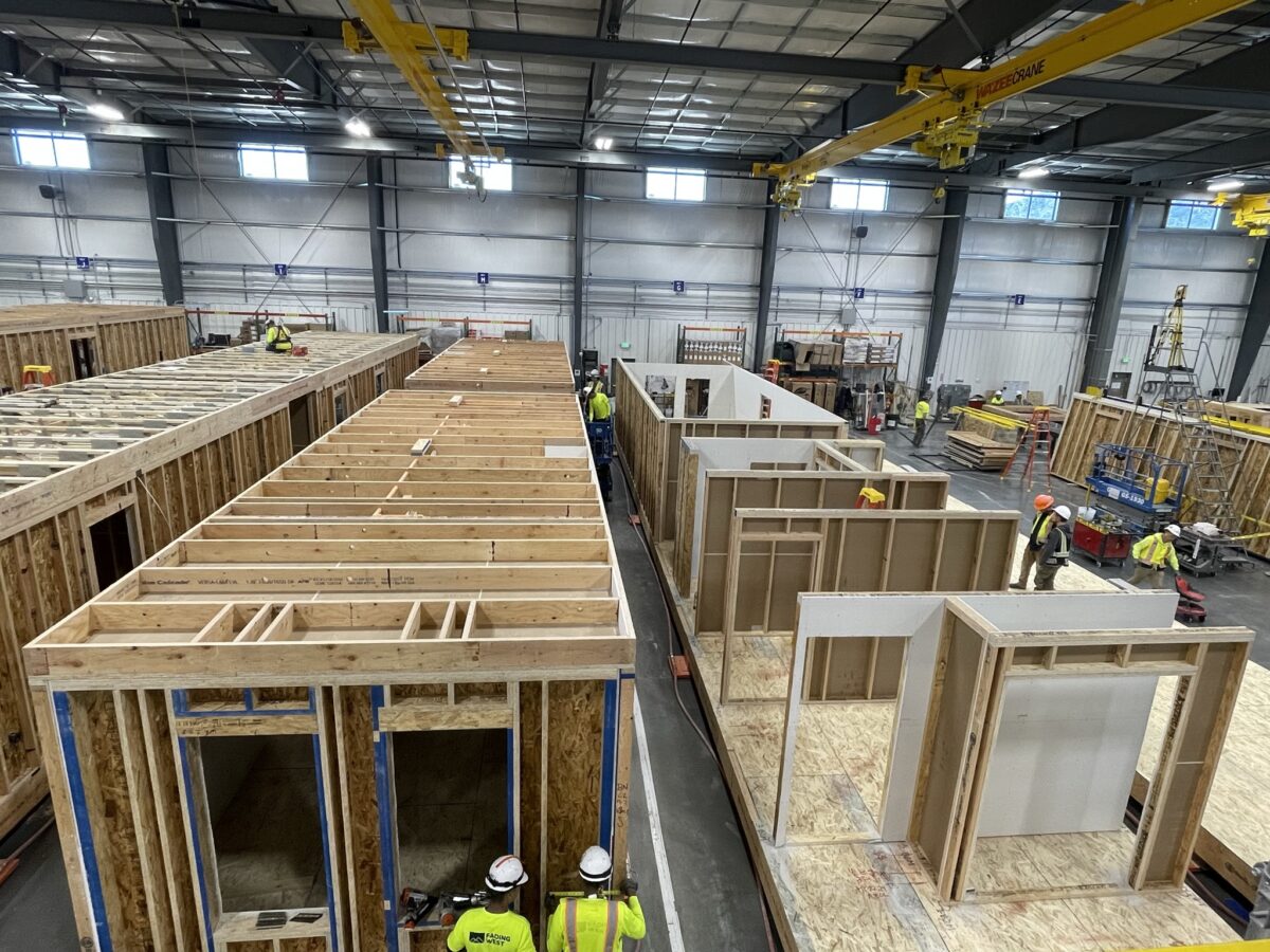 A photograph from above that show modular production in Fading West's factory.