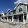 A forced-angle photograph of a five-plex of single-family homes in Buena Vista's affordable housing development, The Farm.