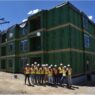 The EVstudio EVolution Design Studio team in front of the Justice Center Apartments in Breckenridge, CO.