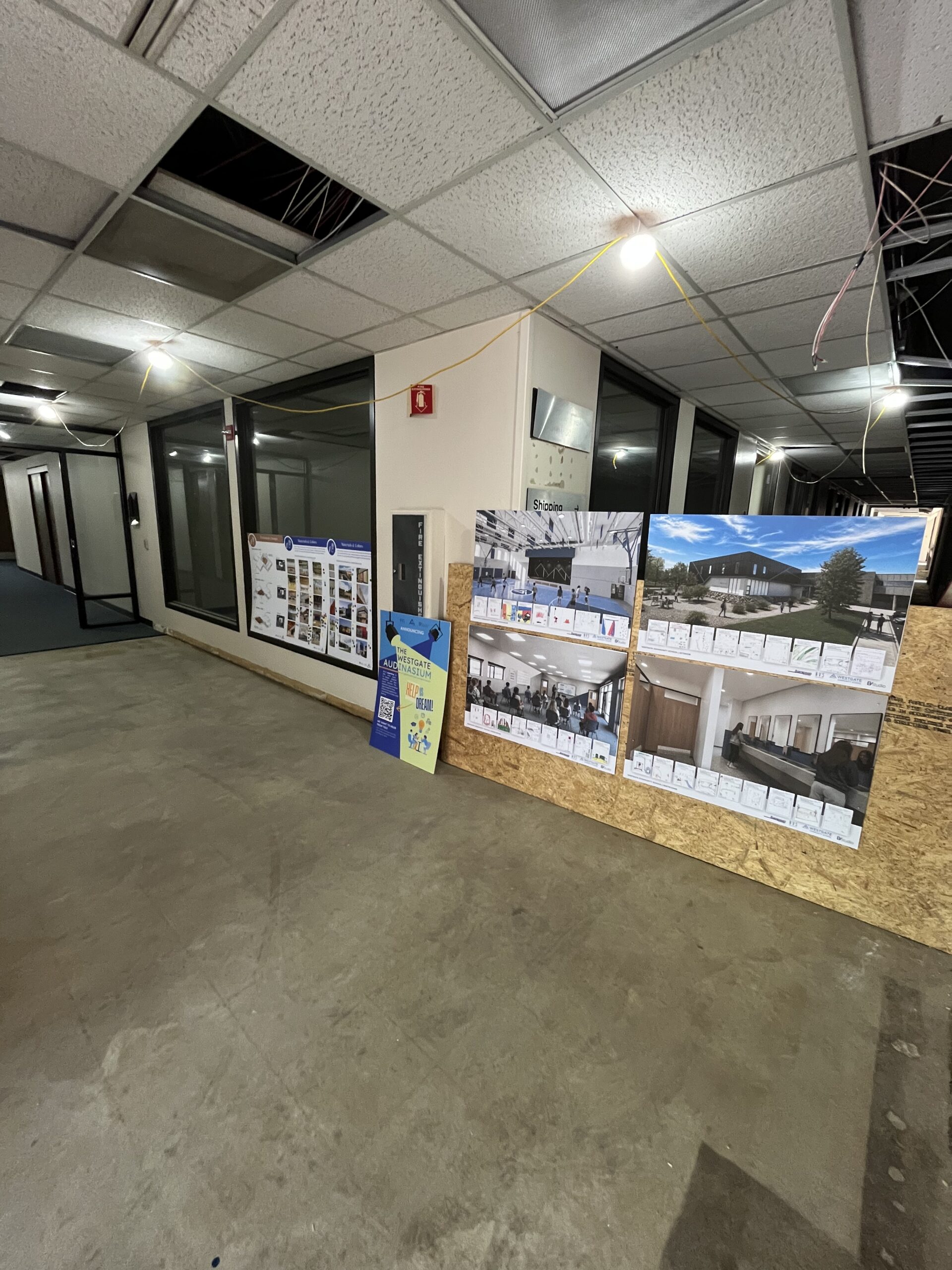 Graphic boards set up in the hallway for the north building