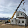 Crane setting a modular piece