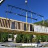 A modular set piece being placed at the site of a multi-family build