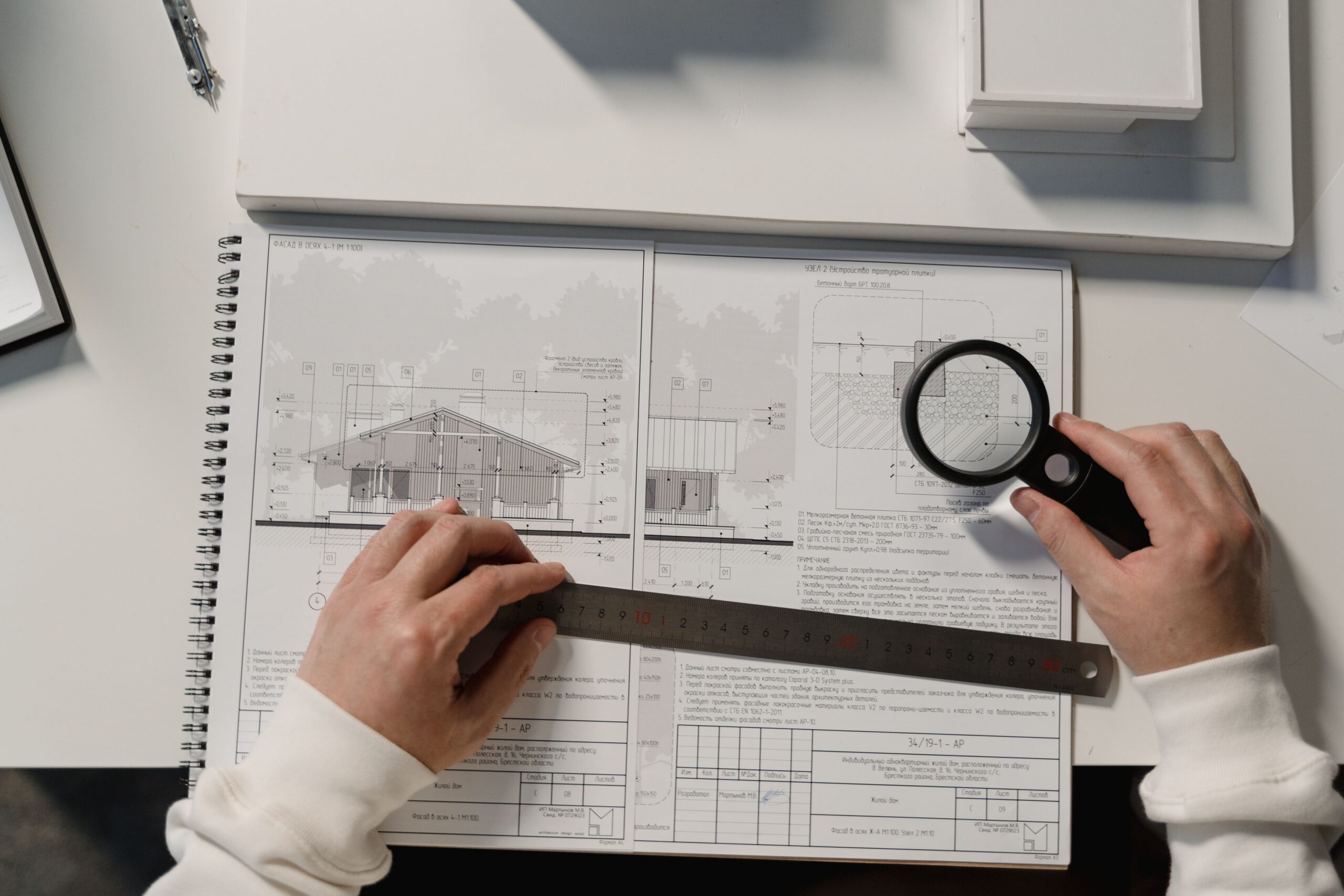 Reviewing architectural and structural plans to coordinate minimum shear wall length requirements